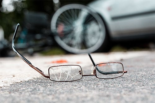 broken eyeglasses resulting from bicycle and car crash.